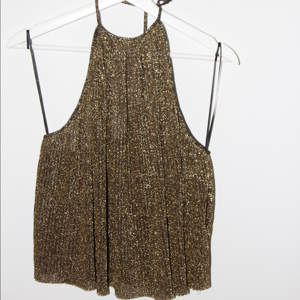 Sparkly halter neck top.